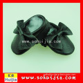2015 wholesale luxury Non-slip lower price black bow wholesale baby shoes for baby girl and boy